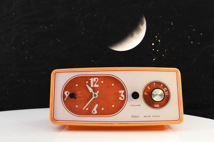 Sears solid state clock radio in orange