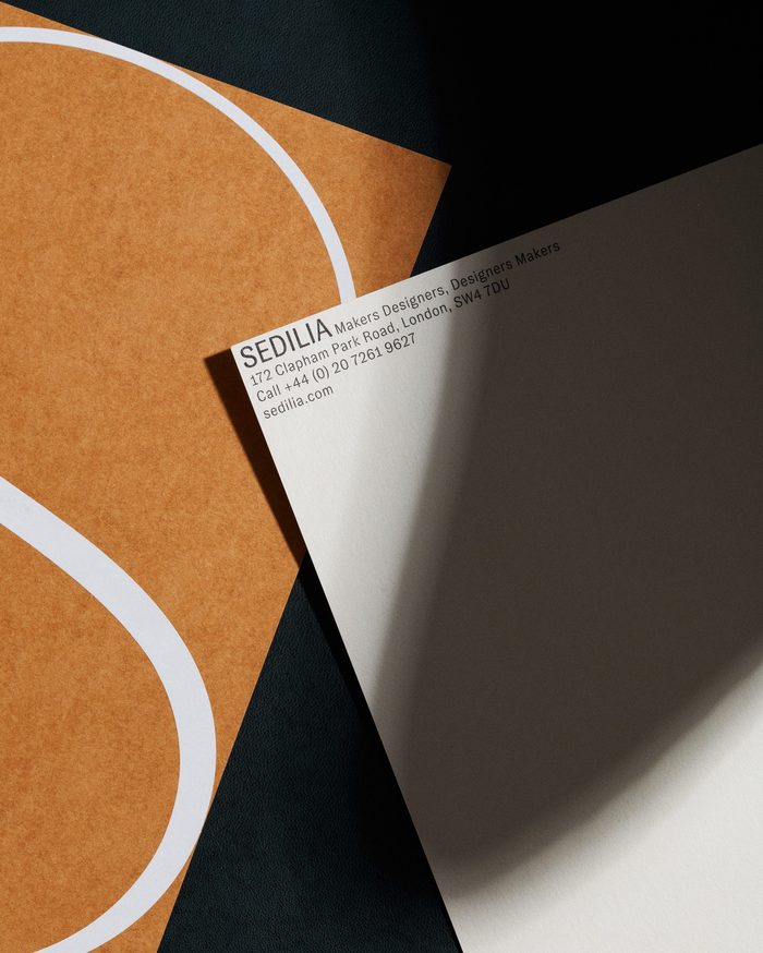 The stationery is printed on a range of beautiful Japanese papers that echo the materials and colours used in the furniture collection. Type is minimal, tucked tightly away into corners.