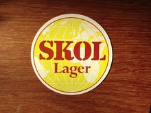 Skol Lager beer coaster and can