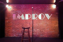 The Improv comedy club logo