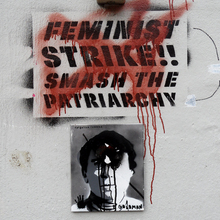 “Feminist Strike!! Smash the Patriarchy” stencil graffiti