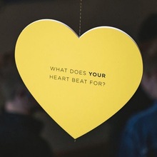 “What does your heart beat for?” hanging hearts display