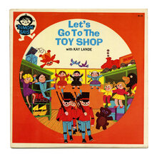 <cite>Let’s Go To The Toy Shop</cite> album art