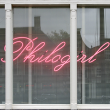 <cite>Philogirl</cite> neon sign