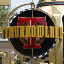 Tomorrowland signs at Disneyland Park and Magic Kingdom