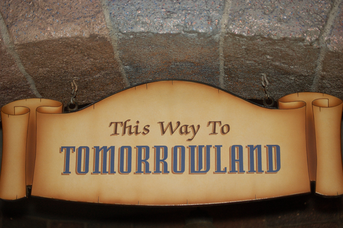 Tomorrowland signs at Disneyland Park and Magic Kingdom 6