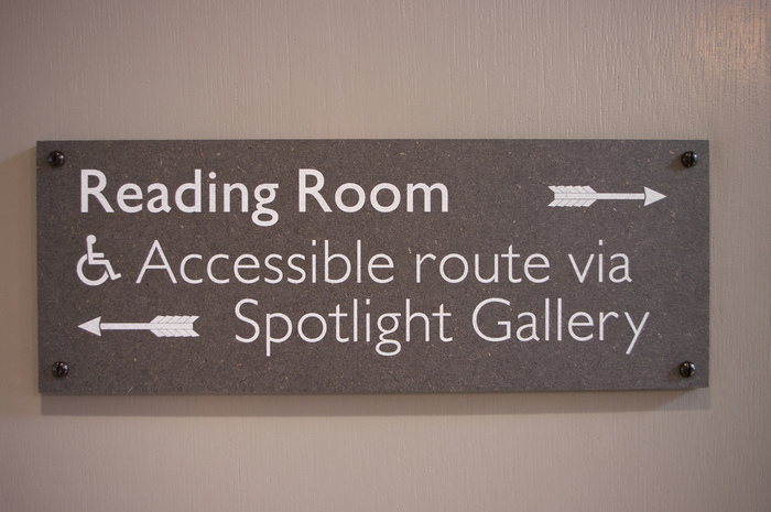 All nameplates and direction signs are Arizona printed on Valchromat. While exhibition graphics are fixed with hidden fixings, these are face-fixed as though part of the building. It seemed a pragmatic decision for a building concerned with arts &amp; crafts.