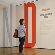 <cite>Soundings: A Contemporary Score</cite> title wall