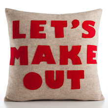“Kiss Me” and “Let’s Make Out” pillows