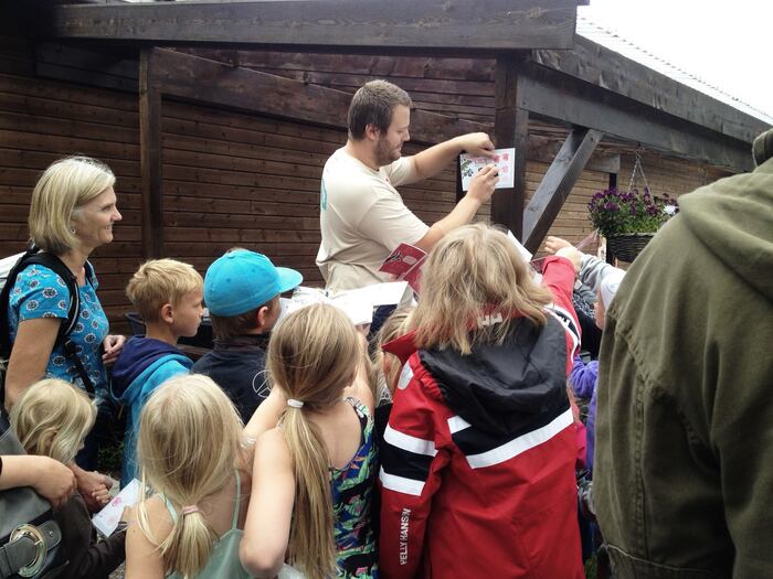 Kids collecting stamps in their passports