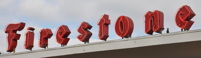 A Firestone location in Los Angeles sports one of the many neon signs installed over the century and still in use today.