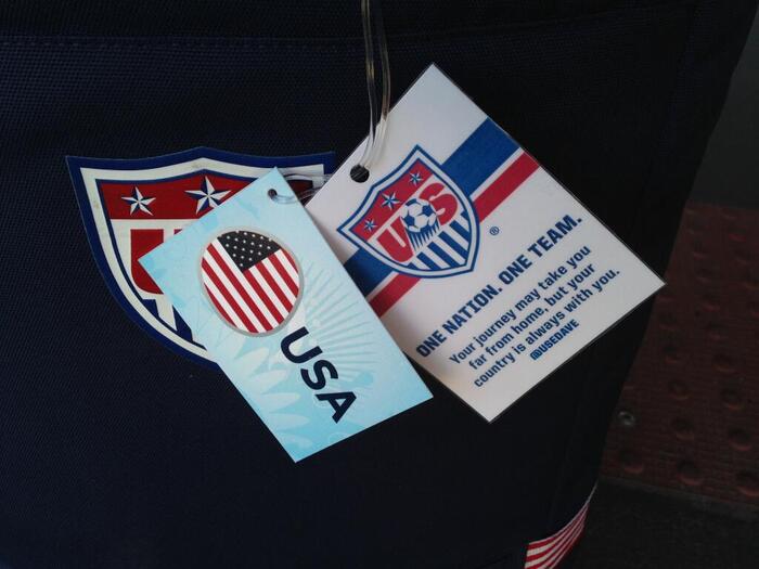 United on the players’ luggage tags.