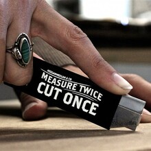 “Measure Twice, Cut Once” box cutter