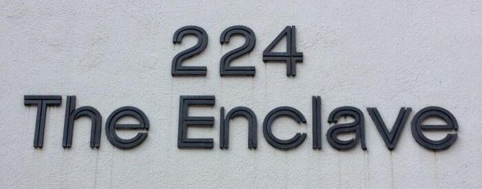 The Enclave residential condominium sign