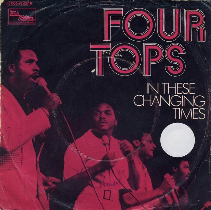 “In These Changing Times” / “Right Before My Eyes”, July 1971. Light Futura caps are used for the title.