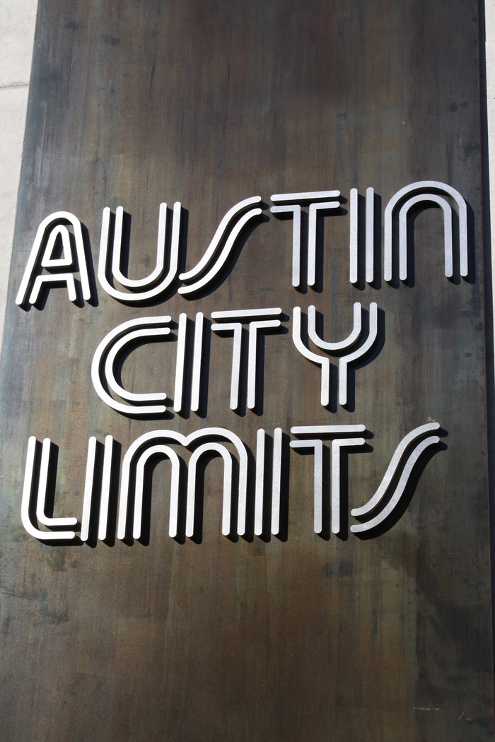This placard is near the outdoor stairsteps that lead up to the Moody Theater in Austin, Texas.