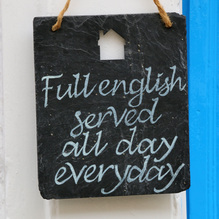 “Full english served all day everyday” sign