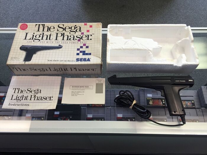 Sega Master System logo and accessory/game packaging 9