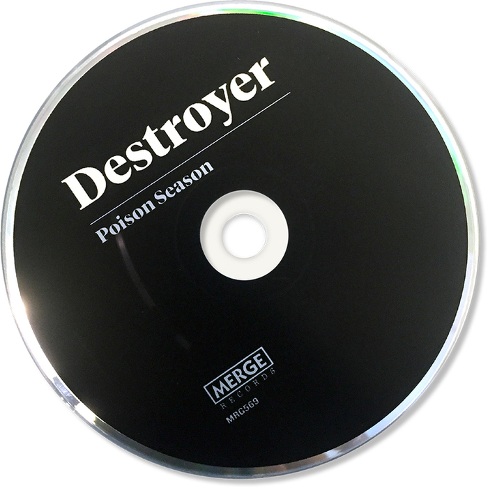The Disc. Artist name and album title set in Tiempos.