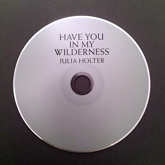 The disc. Titles set in Weiss.