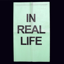 <cite>In Real Life</cite> newsprint / website