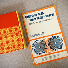 <cite>Choral Warm-Ups for Minds, Ears and Voices</cite> by Leonard Van Camp