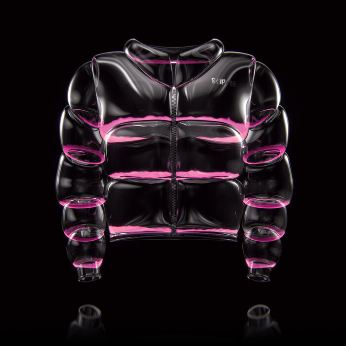 “Liqui-UV transparent plastic soapy puffa jacket. available in pink or green.”