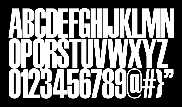 “Schmalfettee” is Jeremy Mickel’s revival of Haettenschweiler’s Schmalfette Grotesk, a design that was originally published as a simple alphabet in Lettera, Vol. 1, 1954. In the 1950s–80s, designers often used the Lettera series as type sourcebooks, photostatting the showings for display lettering. This interpretation of Schmalfette (one of many) simplifies some of the shapes, most notably the curved leg of the original ‘R’.
