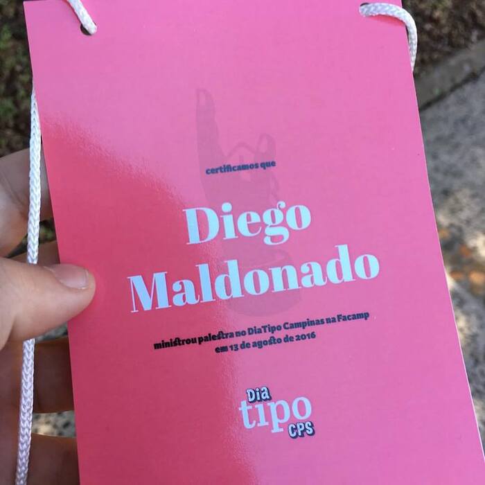 Conference badge with Abril Display and Karmina Sans