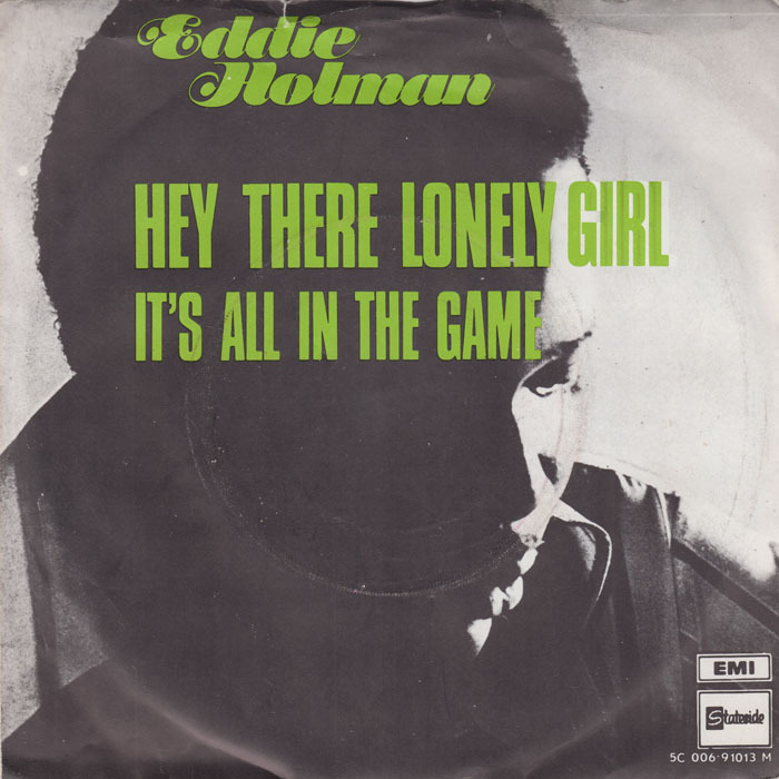 The type for the artist’s name was carried over to the cover for the Dutch 7″ single “Hey There Lonely Girl” / “It’s All In The Game”, EMI / Stateside.