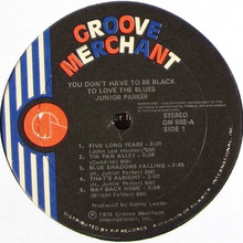 Groove Merchant logo and record labeling