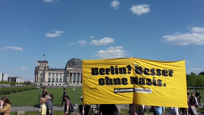 In front of the Reichstag, seat of the German parliament