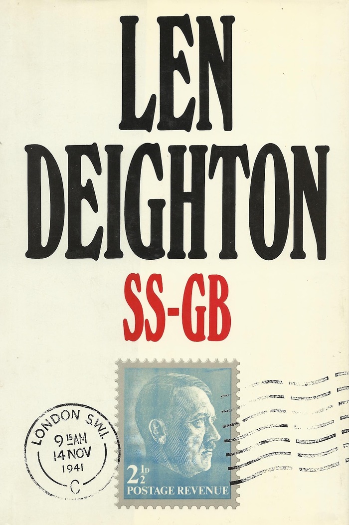 Jonathan Cape, London 1978. Cover design by Raymond Hawkey, with centered caps from Windsor Elongated (and Times New Roman for the stamp).