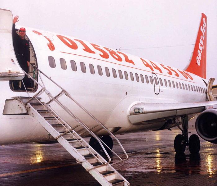 Founder and owner Stelios Haji-Ioannou on the first easyJet flight from Luton to Glasgow, Nov. 10, 1995.