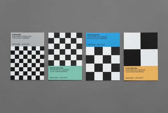 Exhibition flyers in four languages; English, Spanish, French, and Catalan