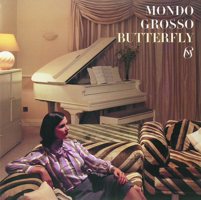 Butterfly (Real Eyes/Epic, 2000). Design and Art Direction by Alias. Photography by Jonathan de Villiers