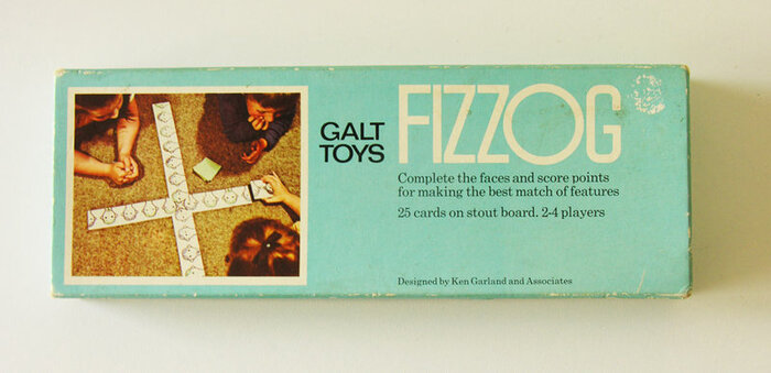 Ken Garland &amp; Associates designed the original Fizzog matching game in 1969. This is a mid-1970s edition. The designer of this box is unclear, but it seems to have been released during Garland’s tenure.