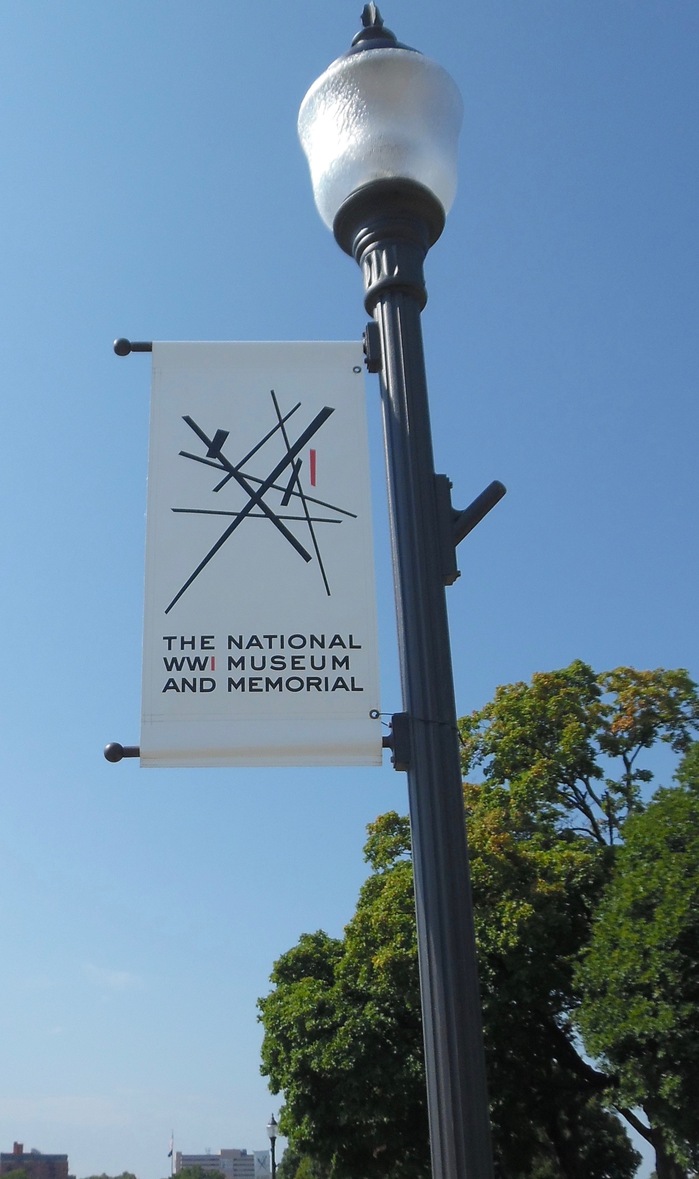 In February 2017, the museum introduced a new logo. “Titled ‘Intersections,’ [it] features nine intersecting lines that conjure a ‘tangle’ of images related to the war: barbed wire, railroad tracks, factories, beams of broken homes, the chaos of war. The logo [was] designed for free by St. Louis-based advertising agency Rodgers Townsend.” — The Kansas City Star