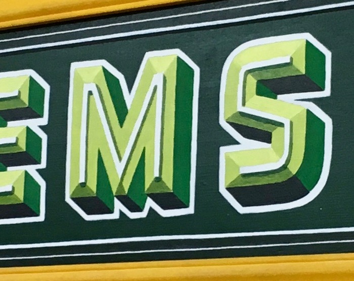 It took me quite a while to realize this sign was painted &mdash; not printed, or cut from vinyl. Staring closely at the sign for a long time earned me plenty of quizzical looks from fellow shoppers.