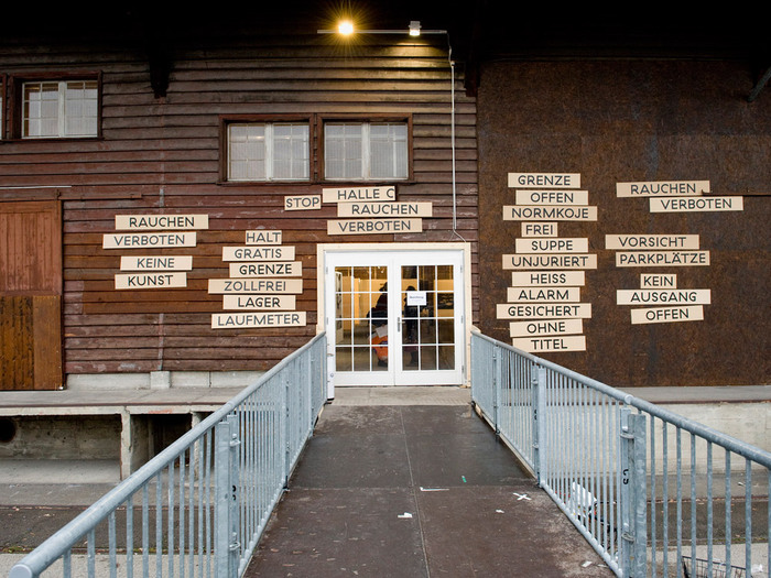 Signage for the entrance to the exhibition area.