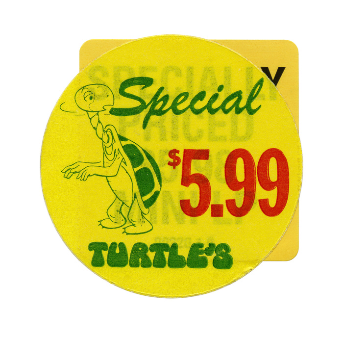 &ldquo;Special&rdquo; sticker. The script is Brush.