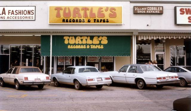 Store front of Turtle’s Records and Tapes on Memorial Drive in Stone Mountain, Georgia. The photo is by Randy Blazak who used to work here in the early 1980s. Make sure to read his blog post about how music was his escape route from racism.