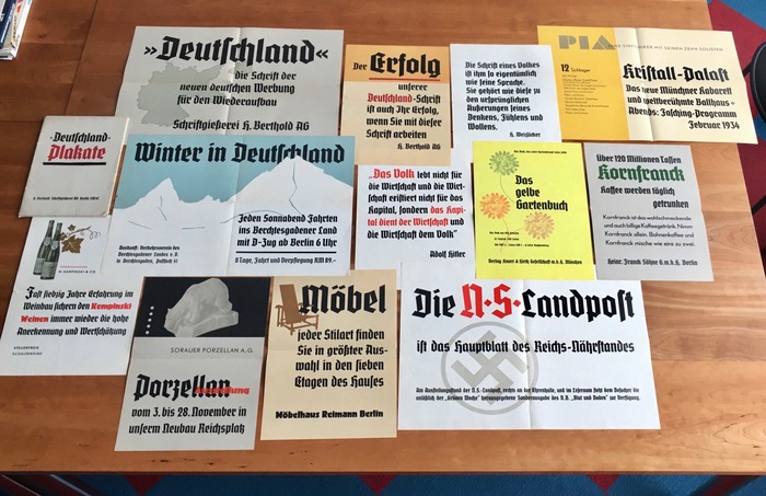This specimen of Deutschland’s Plakat (poster) sizes contains twelve folded A3 and A2 sheets. Several of them are littered with Nazi propaganda — see the quote by Adolf Hitler, or the ad for the Nationalsozialistische Landpost, the organ of the Reichs-Nährstand, announcing a special “Blood and Soil” issue of the Völkischer Beobachter, the newspaper of the Nazi Party notorious for their racist agitation.