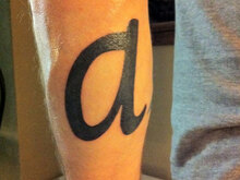 ‘a’ tattoo