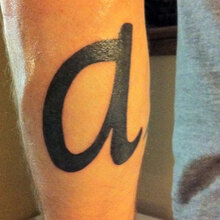 ‘a’ tattoo