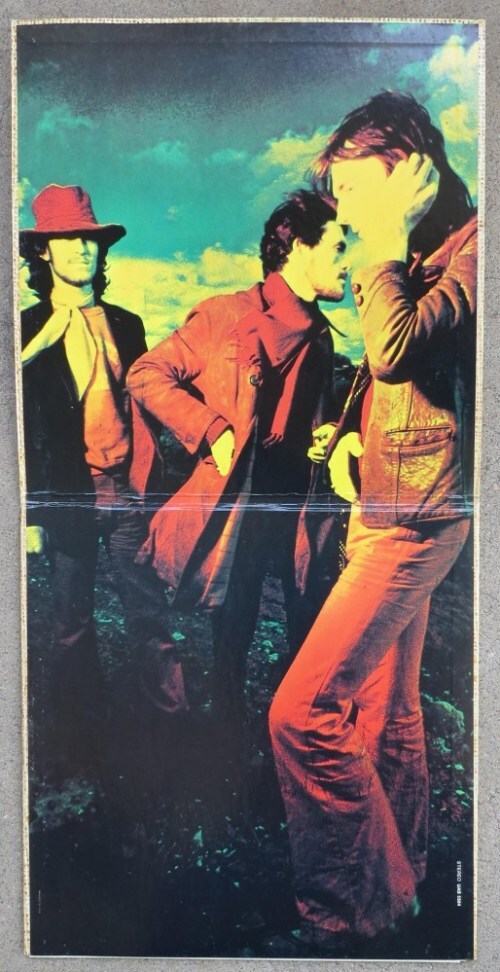 A color photograph of the band inside the gatefold cover.