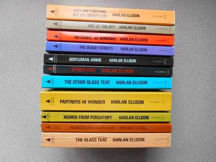 Book spines. The paperbacks come with green edges.