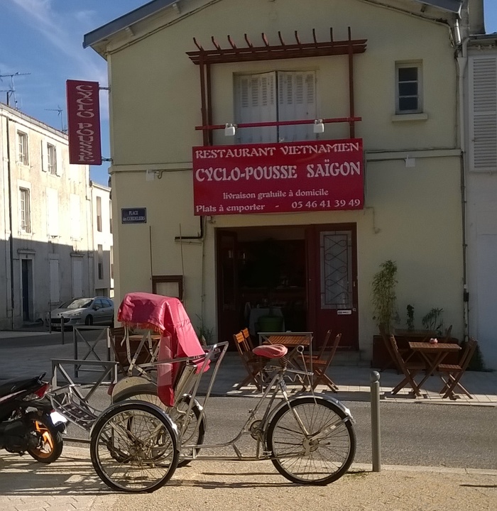 Vietnamese restaurant Cyclo-Pousse relies on French classic Auriol, and (mis)uses it in stacked and stretched letters (left).