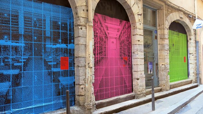 Scaled-up web images on the building at Rue Major Martin, Lyon.