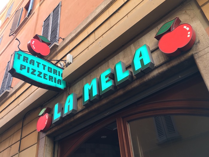 La Mela trattoria pizzeria signs 2